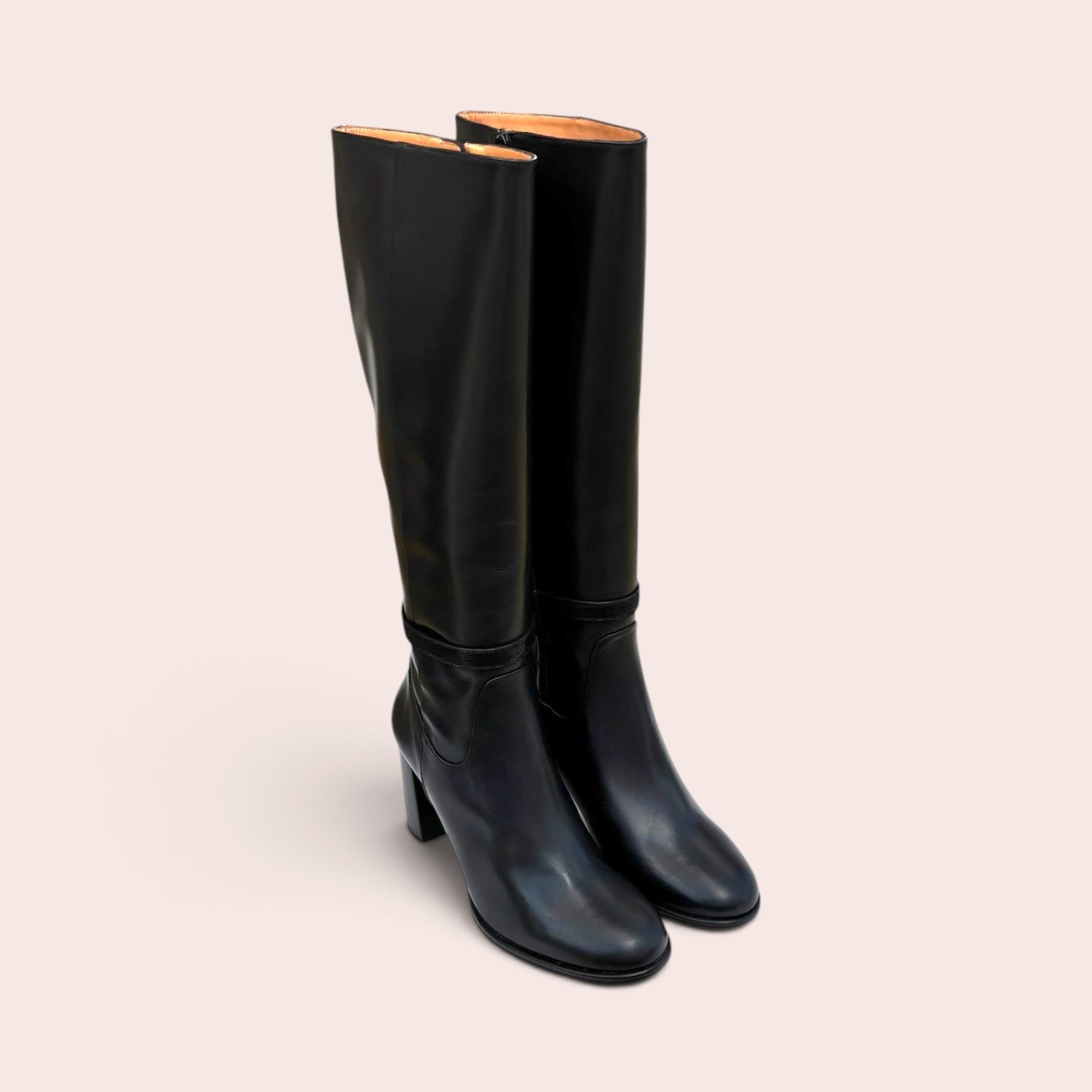 Pair of smooth black leather knee-high boots with a sturdy block heel and a refined ankle strap detail.