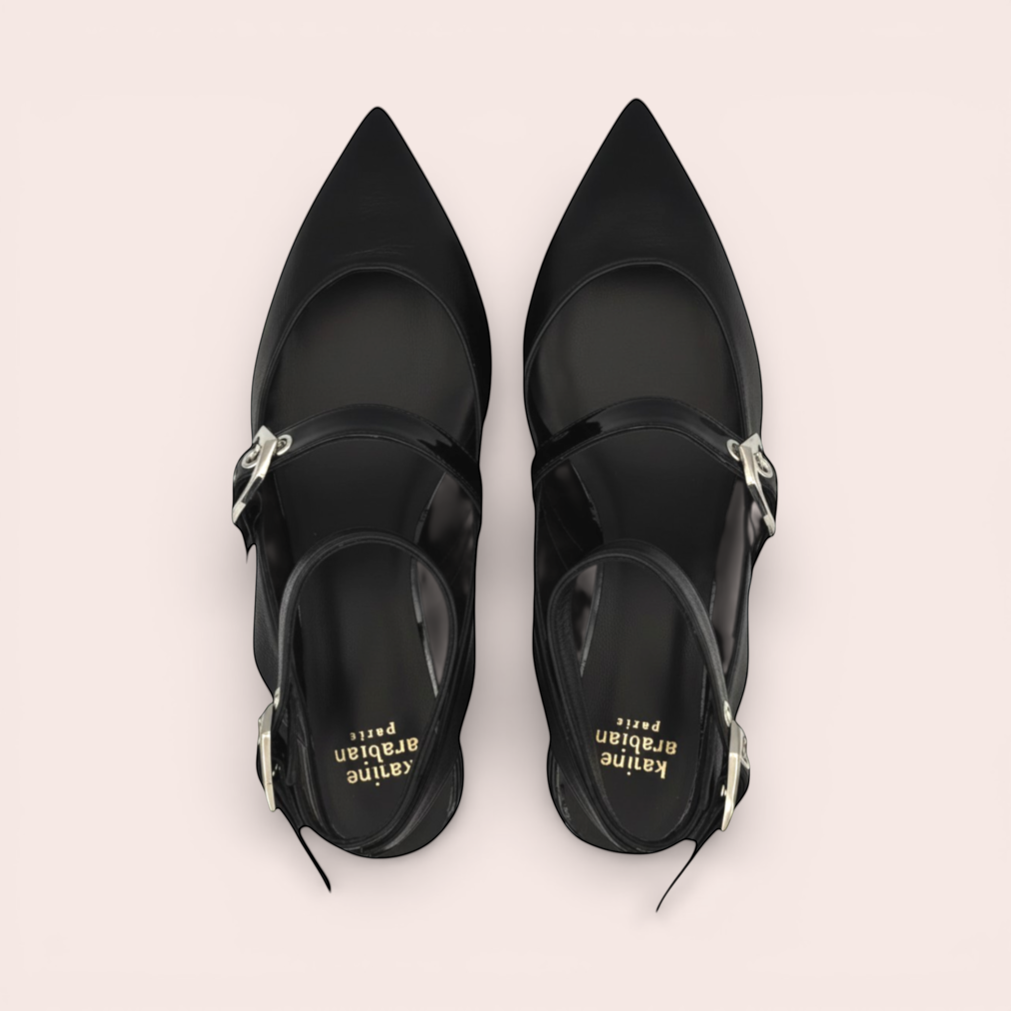 Black leather slingback heels with pointed toe, double ankle straps, silver square buckles, and a sculpted black jeweled heel.