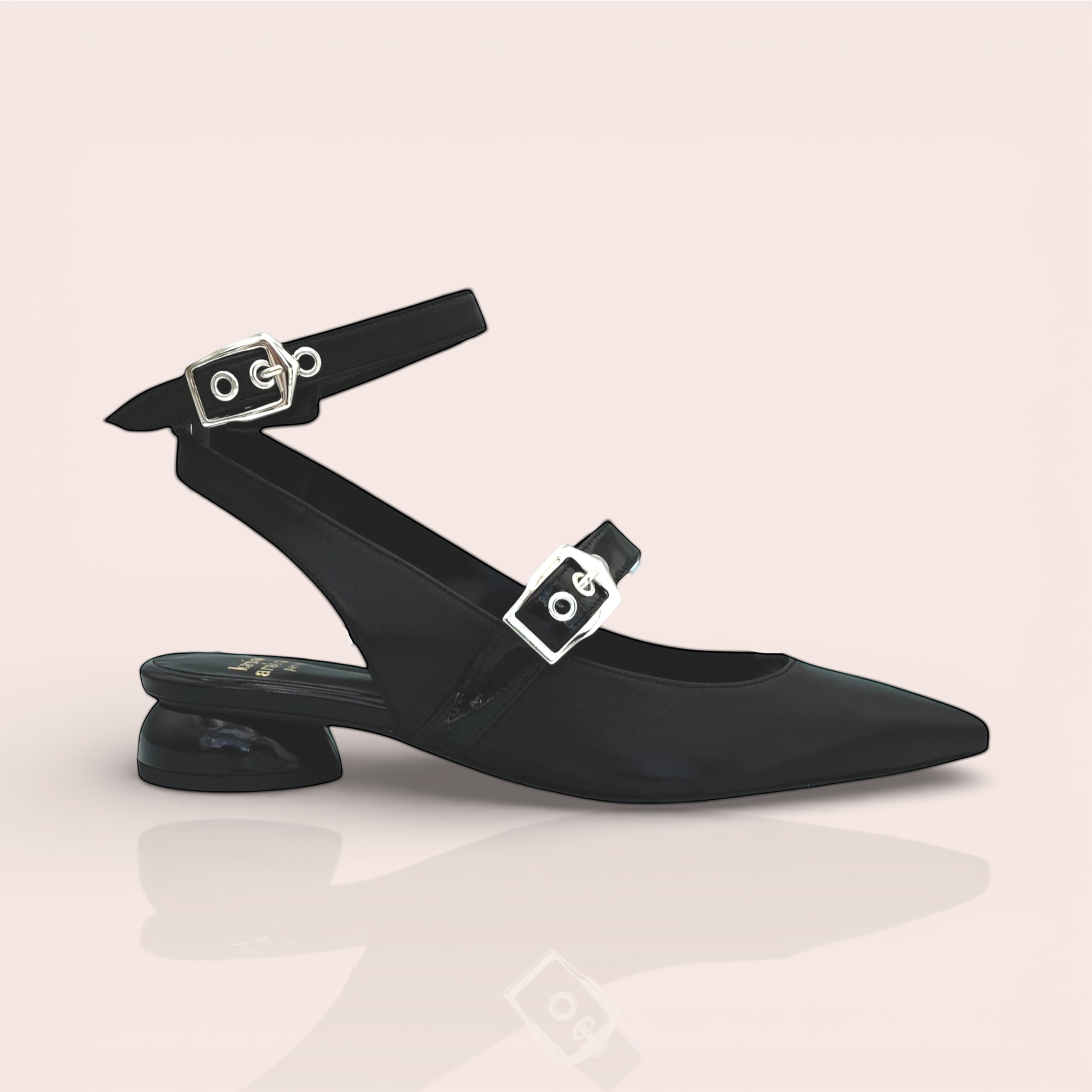 Black leather slingback sandals with pointed toe, double ankle straps featuring silver buckles, and a sculpted black heel.