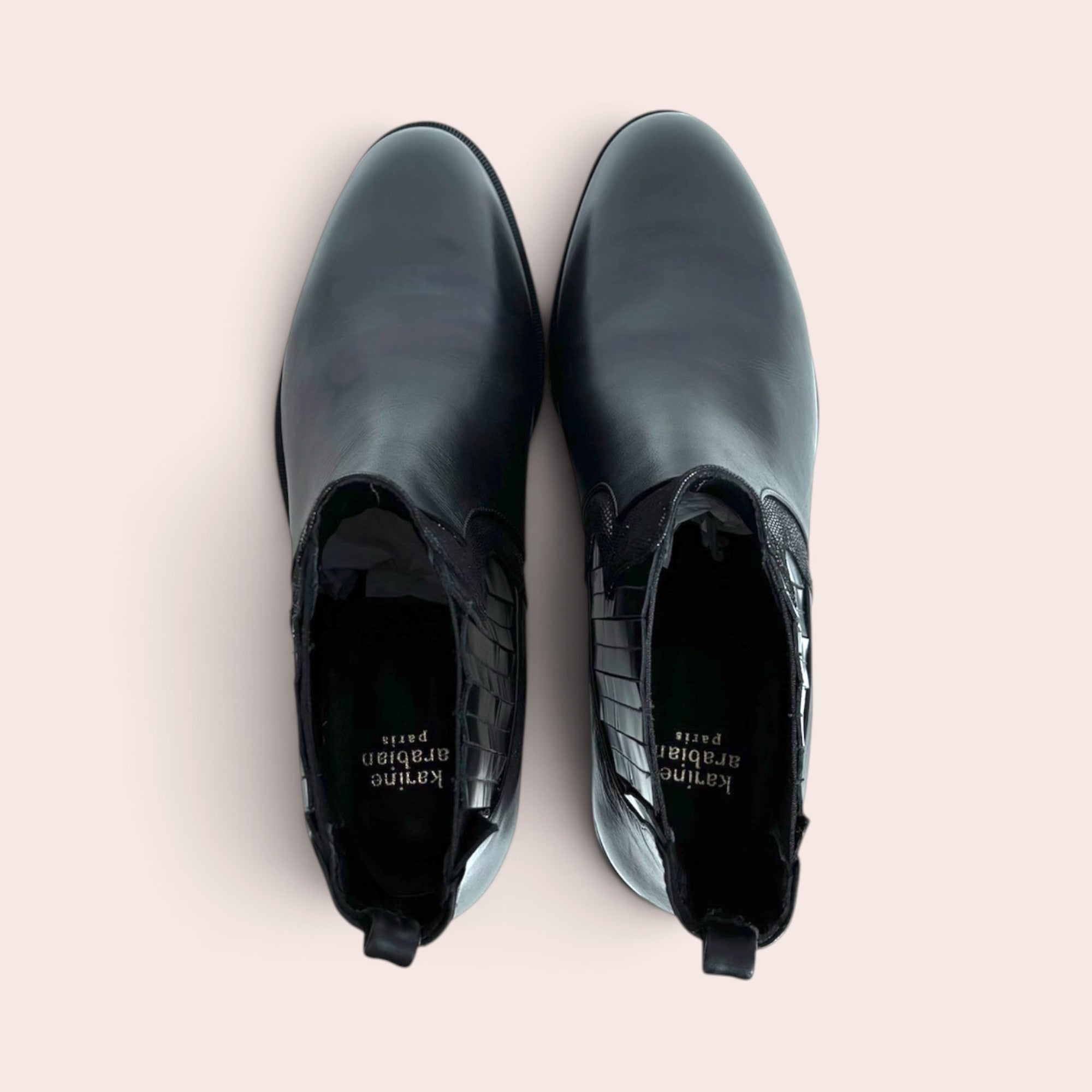 Top view of Karine Arabian black leather Chelsea boots featuring textured side gussets and a sleek slip-on design.