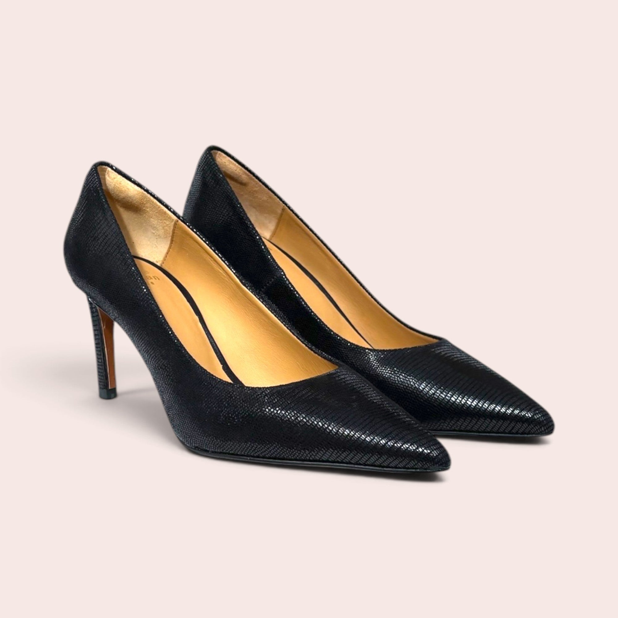 Karine Arabian black pointed-toe stiletto pumps with a textured exotic leather finish and beige interior lining.