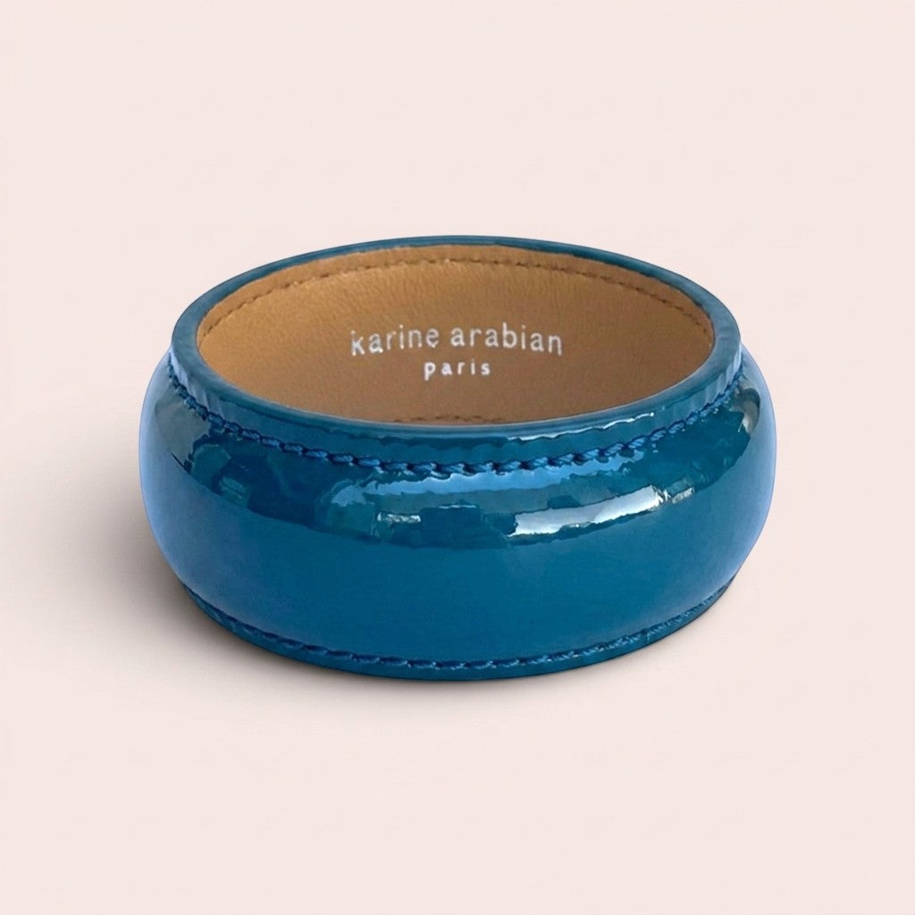 Karine Arabian DUA wide bangle bracelet in glossy teal patent leather with tan interior lining