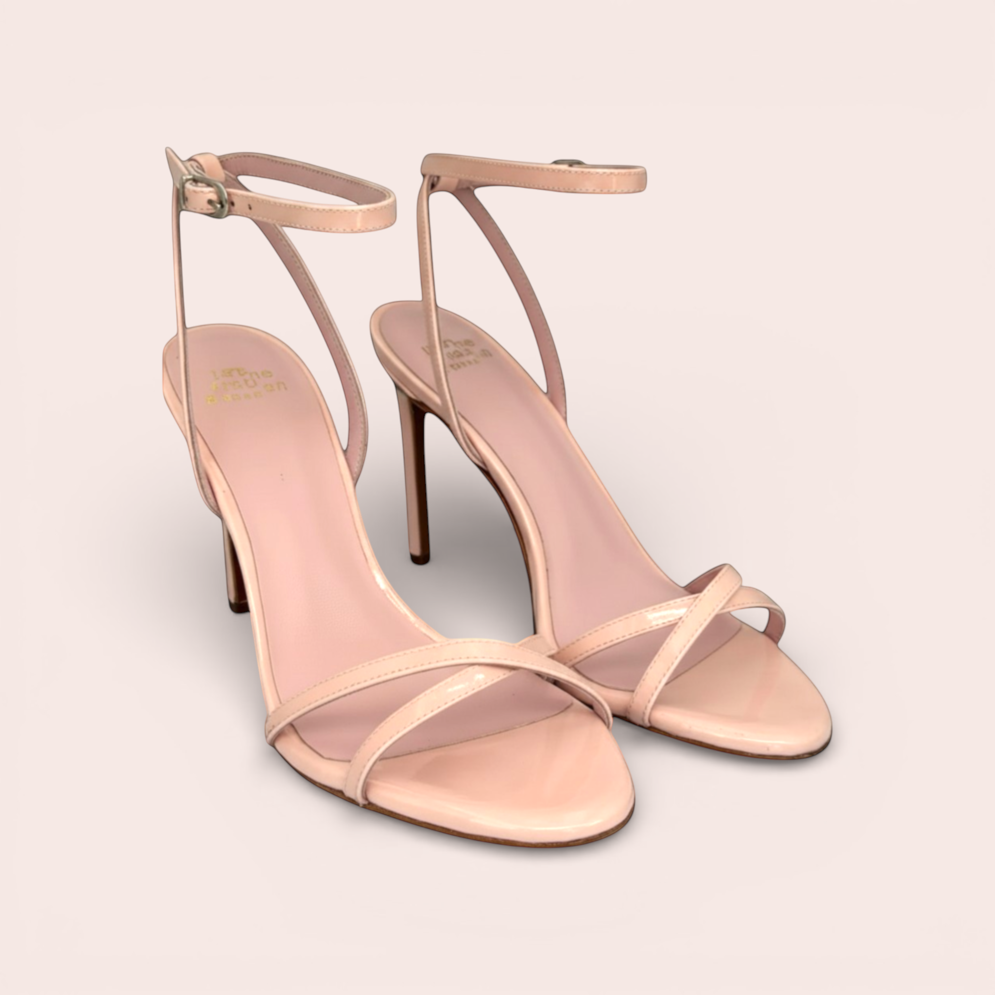 Pale pink patent leather CINDY sandals with thin straps, ankle strap, and stiletto heel.