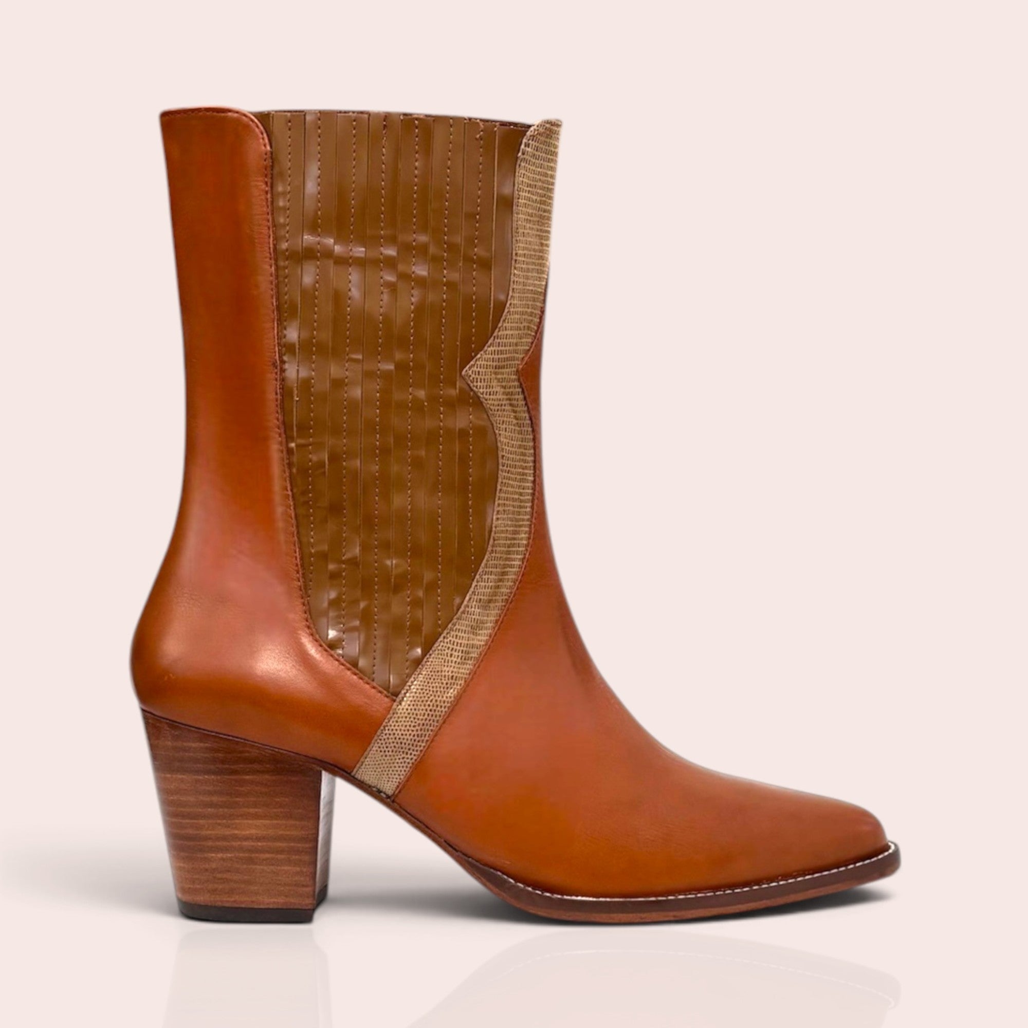Tan leather mid-calf boots with a pointed toe, stacked block heel, and snake-embossed textured side paneling.