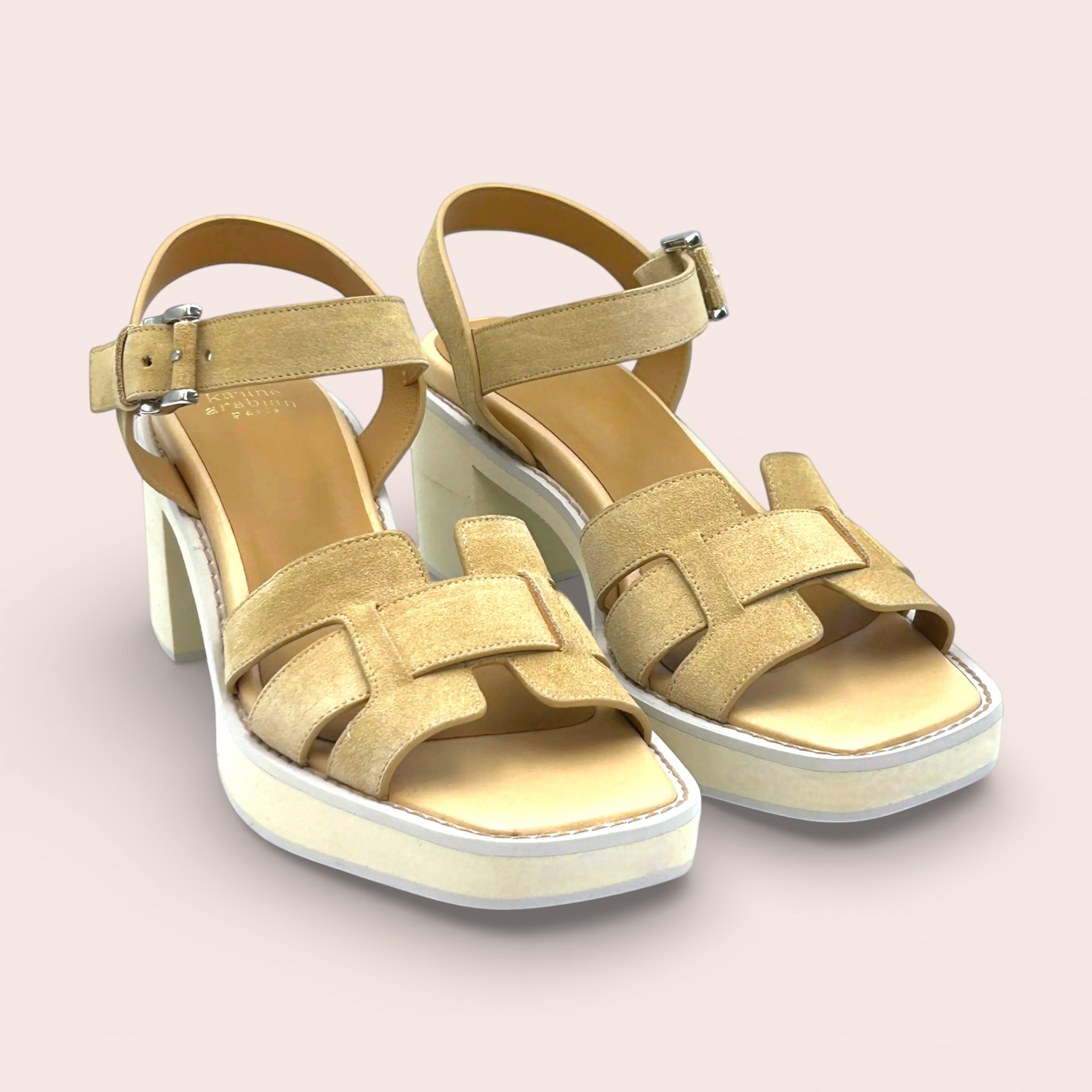 Tan suede platform sandals with interlocking straps and a 65mm block heel. Adjustable ankle strap with silver buckle.