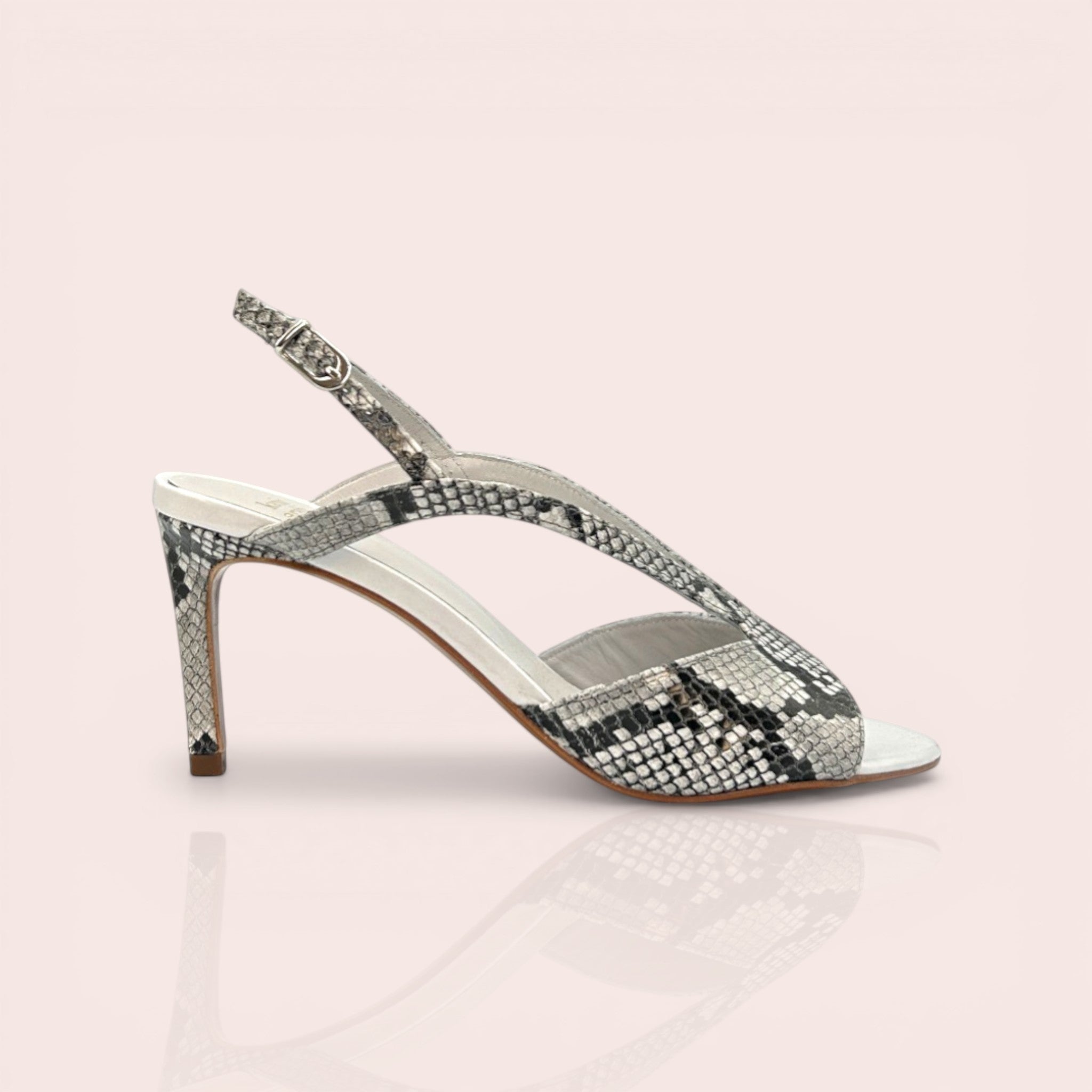 Slingback sandal with taupe, white, and black python print leather straps and a pale pink patent leather heel. Features a 65mm stiletto heel and adjustable ankle strap.